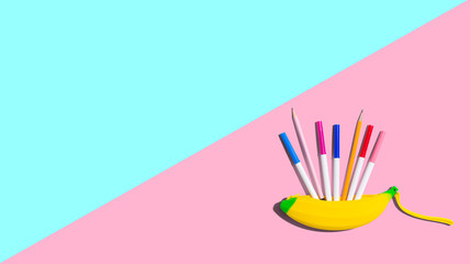 Banana shaped pen case with colorful pens and pencils