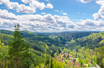 Fototapeta na wymiar Slavkov Forest aerial panoramic view with hills and green trees near Carlsbad town, Karlovy Vary district, West Bohemia, Czech Republic