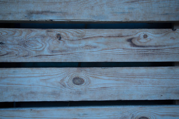 Wooden background blue shade. The texture of a rough-hewn.