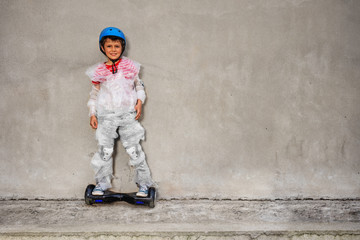 Boy ride hoverboard in overprotecting bubble wrap - obrazy, fototapety, plakaty
