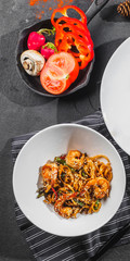 Wok shrimps prawns with noodles and vegetables