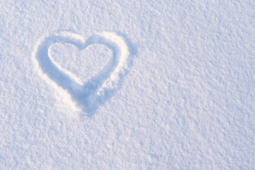 Valentine's Day card with a heart in the snow