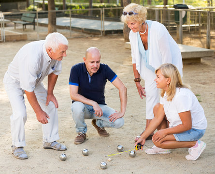 Mature People Playing Bocce