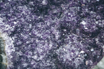 Macro photo of a lilac or violet mineral of amethyst druse