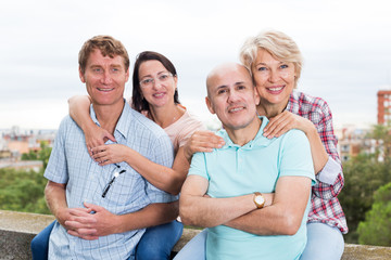 Portrait of smiling mature people outdoors