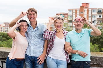 smiling mature people in glasses