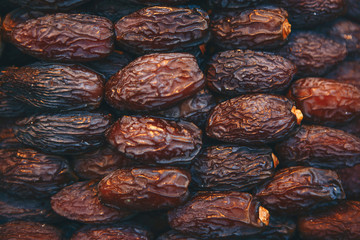 Close up dates background. Selling dates in the local market or harvest