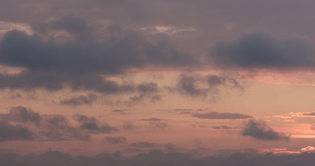 summer sunset skyscape with moving clouds