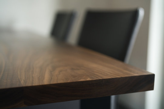 Closeup shot of walnut dining table