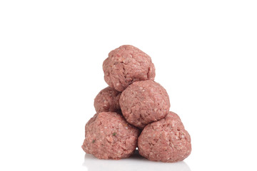 stack of raw meatballs
