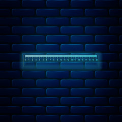 Glowing neon Ruler icon isolated on brick wall background. Straightedge symbol. Vector Illustration