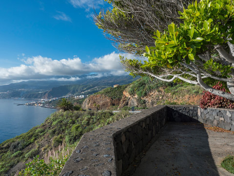 La Palma, Canary Islands, view from viewpoint Mirador de San Juanito with view on Santra Cruz de la Palma and ocean. Blue sky background