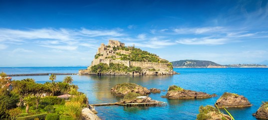 Aragonese Castle is most popular landmark in Tyrrhenian sea near Ischia island, Italy. - obrazy, fototapety, plakaty
