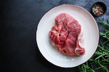 raw meat, piece of pork (healthy food, vitamins ingredients) menu concept. food background. top view. copy space