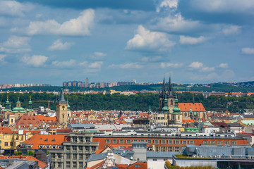 View of Prague with a green strip of parks in the background