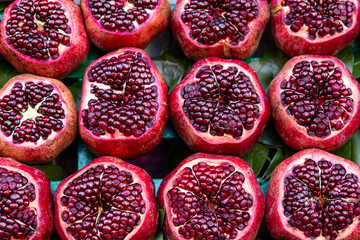 Tasty red pomegranates, close up. 