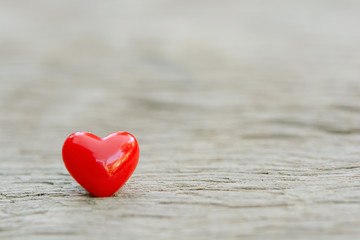 Fototapeta premium Valentines Day background with red hearts on plank wooden, copy space.