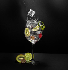 Fruit cocktail with ice and splash