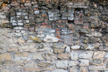 Structure of natural stones close-up. The stones are piled high.