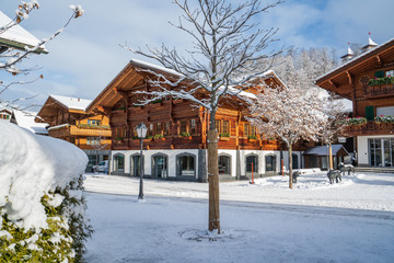 Gstaad promenade with its chalets in winter