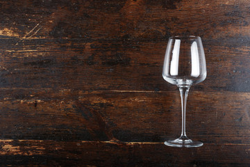 empty wine glass on wooden background