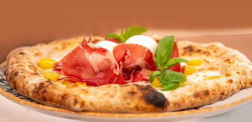 Italian Pizza with tomato and Mozzarella. Gourmet Food  Close up
