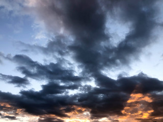 Dark clouds in the sky with a dramatic mood at sunset