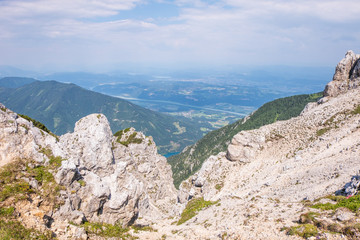 Fototapeta na wymiar View from mountain Hochobir to valley Rosental, lake Freibach Stausee