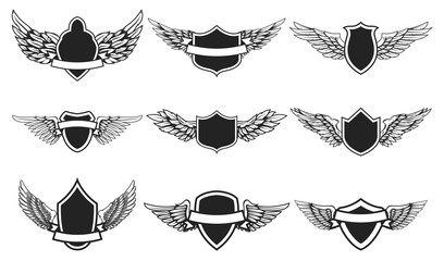 Set of emblems with wings. Design element for logo, label, emblem, sign, badge. Vector illustration