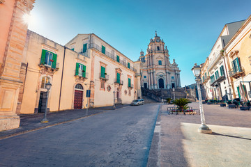 Bright spring scene of Piazza Duomo with  Duomo San Giorgio - baroque Catholic church. Wonderful morning cityscape of Ragusa, Sicily, Italy, Europe. Traveling concept background.