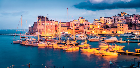 Fantastic evening cityscape of of Castellammare del Golfo town. Dramatic seascape of Mediterranean sea. Picturesque scene of Sicily, Trapani Province, Europe. Traveling concept background.