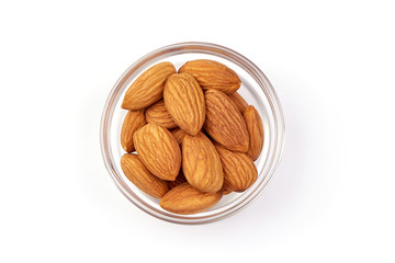 Almond nuts in a bowl, isolated on white background