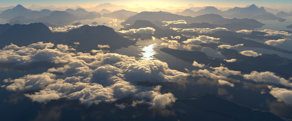 Beautiful sunset panoramic landscape high above mountain and clouds. Yellow light reflects from the water and lit clouds cinematic. Evening or early morning sun. Fresh clean nature.