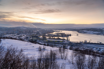 Fototapeta na wymiar Winter views of the city and the Kola Bay from high hills in the vicinity of Murmansk.