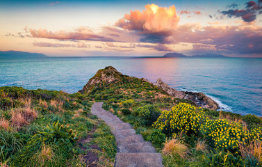 Captivating spring view of Milazzo cape. Perfect sunrise on nature reserve Piscina di Venere,...
