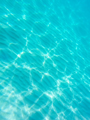Fototapeta na wymiar Underwater photo of ocean sandy floor