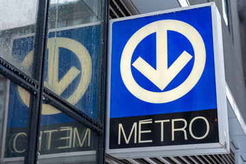 Montreal metro sign with reflection - obrazy, fototapety, plakaty