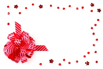 Red bow on a white background. Holiday greeting card, background