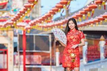 Obraz na płótnie Canvas Beautiful Asian model wearing traditional Cheongsam.happy Chinese new year