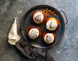 Semla or semlor, vastlakukkel, laskiaispulla is a traditional sweet roll made in various forms in Sweden, Finland, Estonia, Norway, Denmark, especially Shrove Monday and Shrove Tuesday