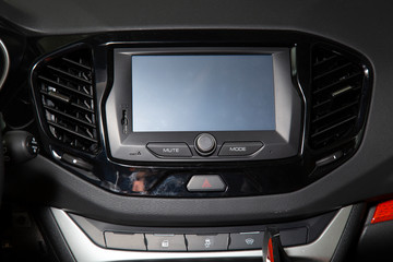 Obraz na płótnie Canvas Standard car multimedia system. Car audio system.