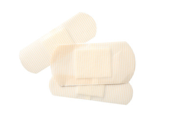 Medical sticking plasters isolated on white. First aid item