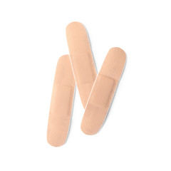 Medical sticking plasters isolated on white. First aid item
