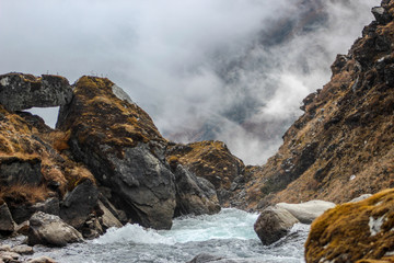 Glacier river flowing through rocks