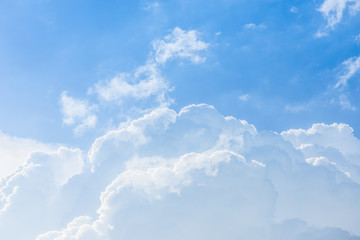 Blue sky and white fluffy clouds