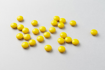 Vitamin C tablets. Bright background. 