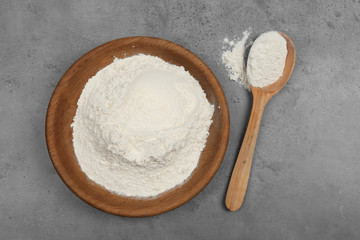 Flour on light grey background, flat lay