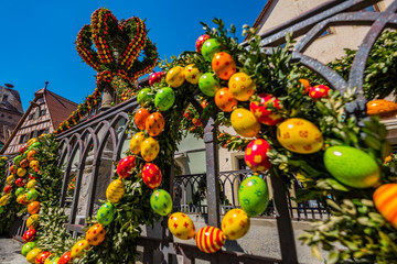 Traditionally decorated easter fountain seen in Bavaria (Germany). Easter fountain. Osterbrunnen. Traditional german easter eggs outdoor decoration. Rothenburg ob der Tauber, Bavaria - 314914161