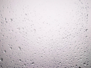 water drops on glass background.Water Droplets on a Window.