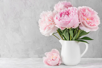 pink peony flowers bouquet on white background with copy space. still life. womens day or wedding concept